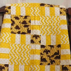 golden age of dinosaurs baby quilt