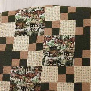 world of dinosaurs baby quilt