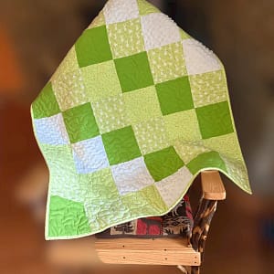 bunny cuddles in green product image