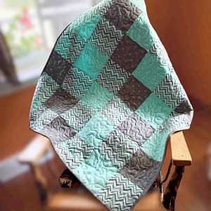 teal and gray baby quilt