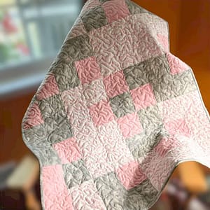 Blooms & blush baby quilt