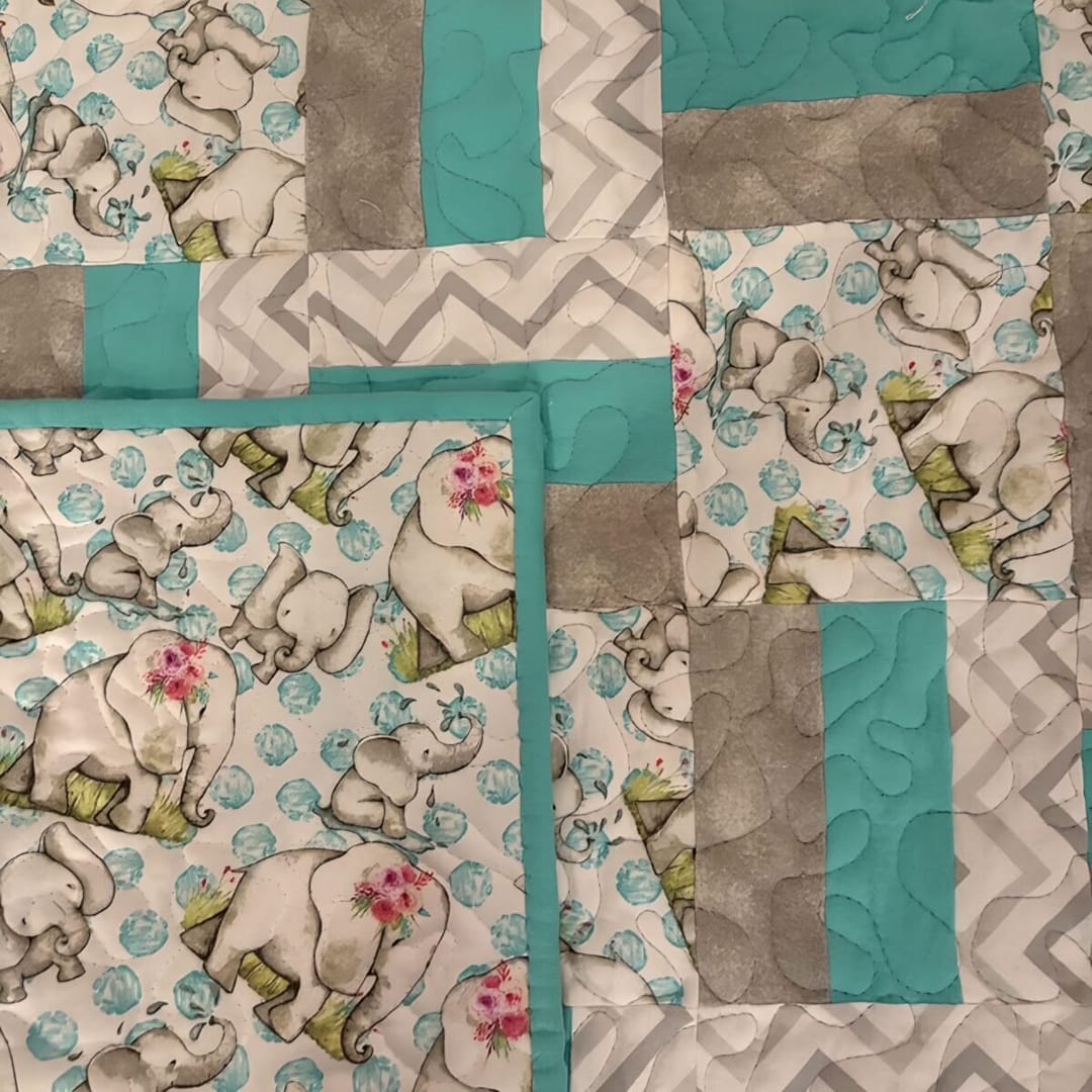 Baby Elephants Baby Quilt Detail of elephants and striped block