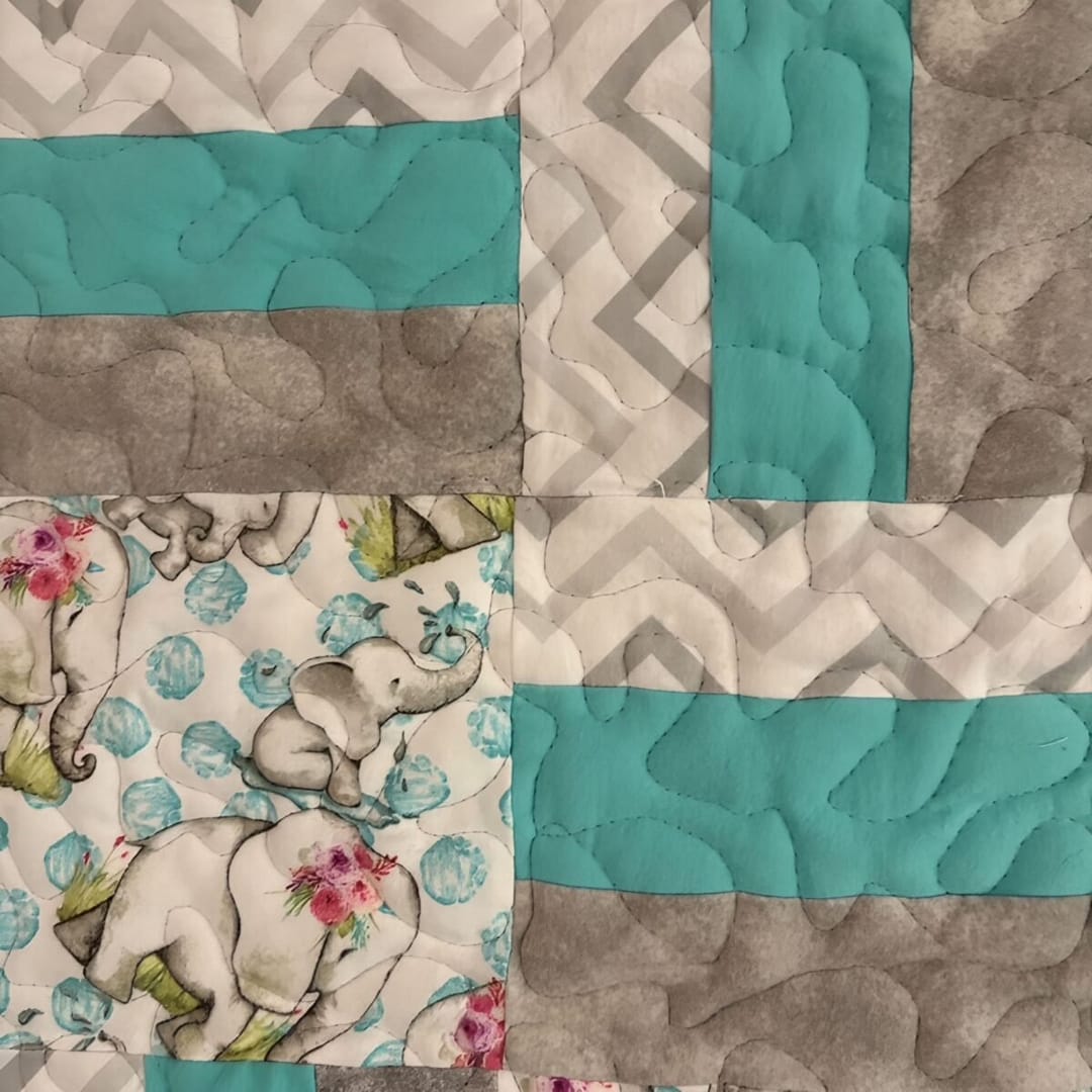 Baby Elephants Baby Quilt Detail of print and striped blocks