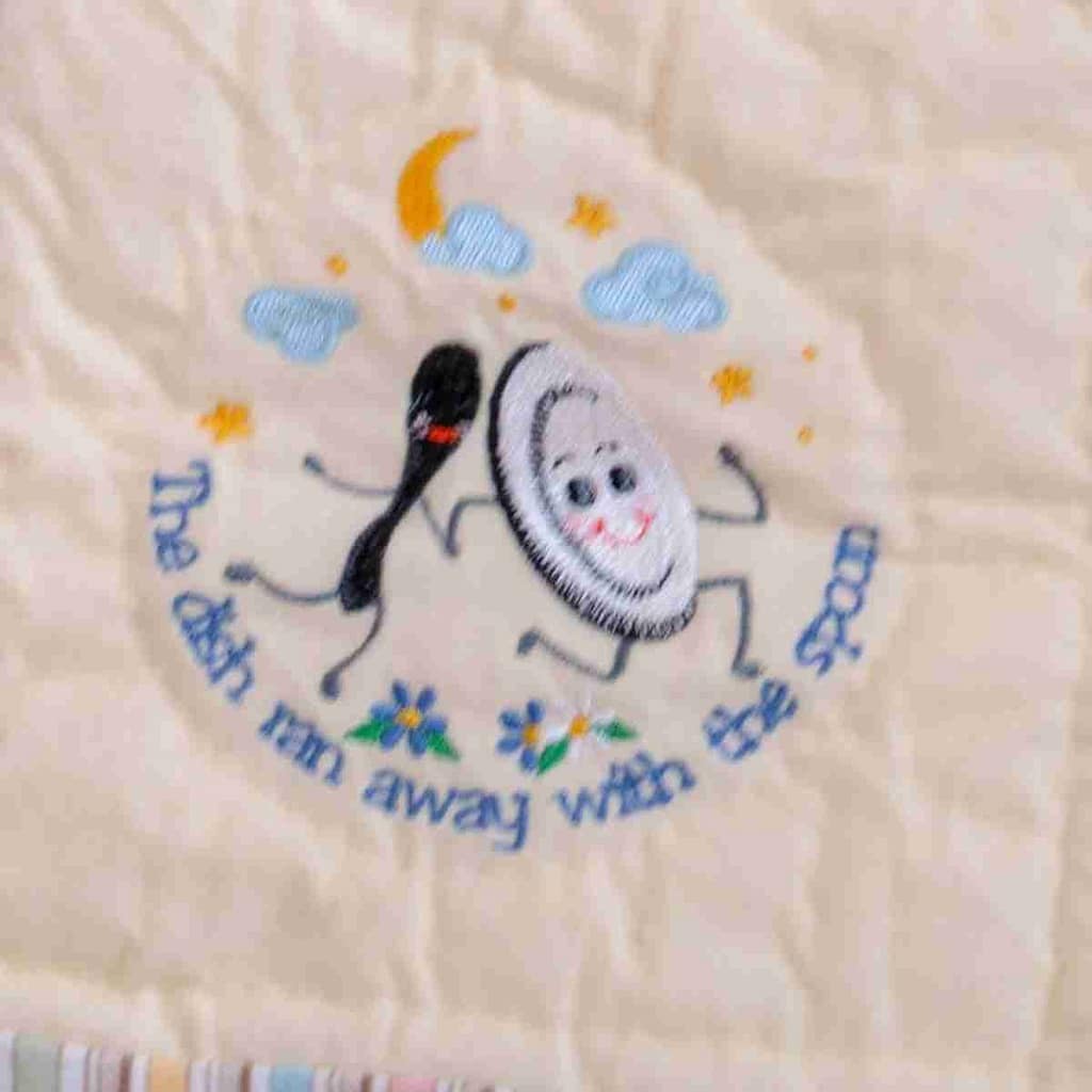customization of a handmade heirloom quilt using designs and names