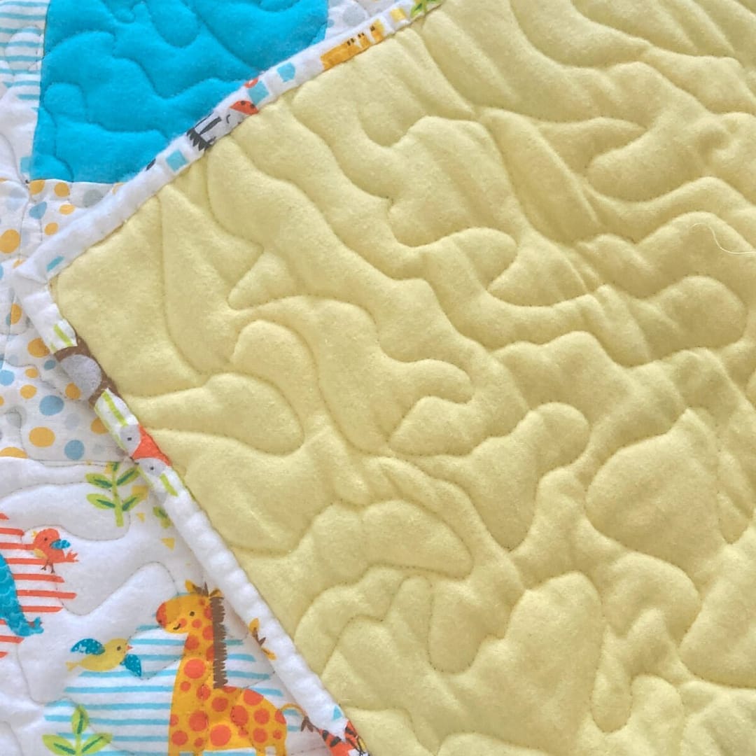 Animal Friends baby quilt with backing