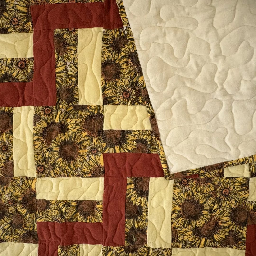 Sunflowers Baby Quilt with visible backing
