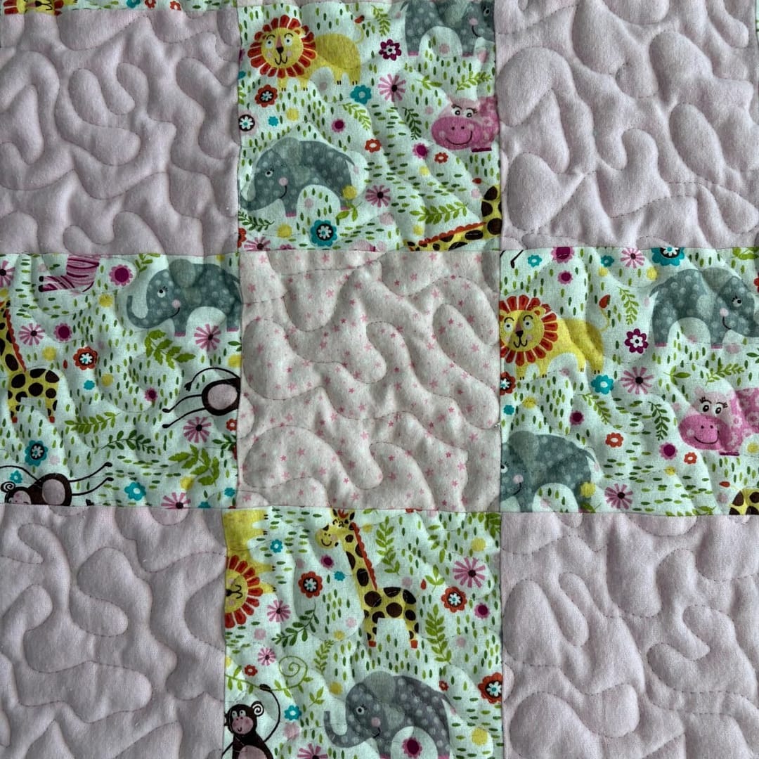 Safari Friends Baby Quilt close up detail of animal patches 2
