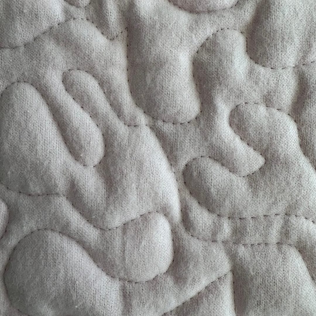 Safari Friends Baby Quilt close up detail of backing
