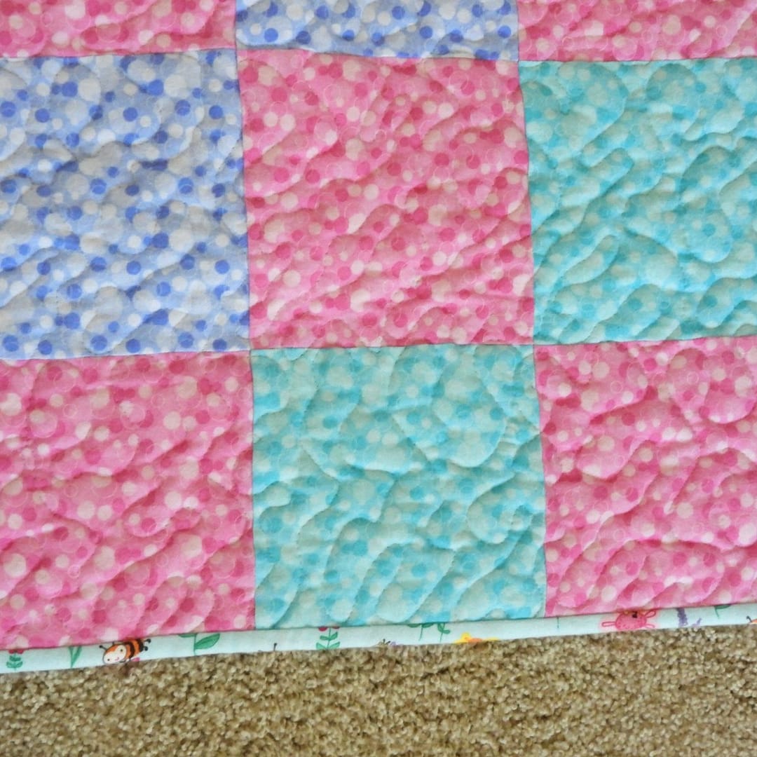 Bright Blooms Baby Quilt detail of pink squares