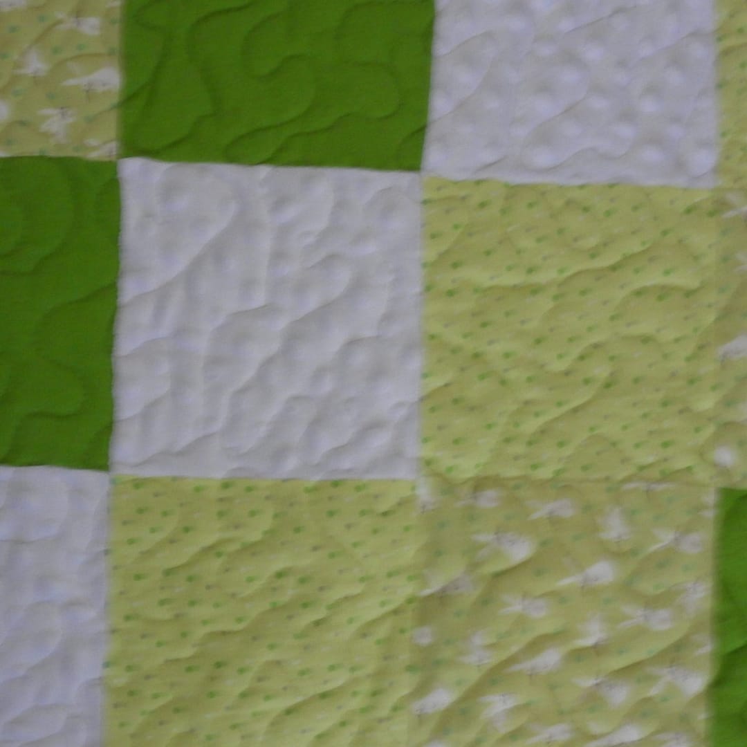 Bunny Cuddles in Green detail of white an d yellow square