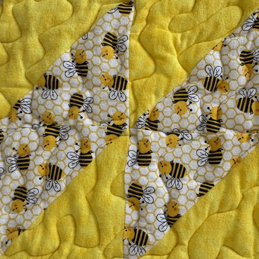 Bee Kind baby Quilt detail of bees