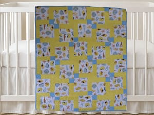 Seashells and Sand New Product Image on white crib