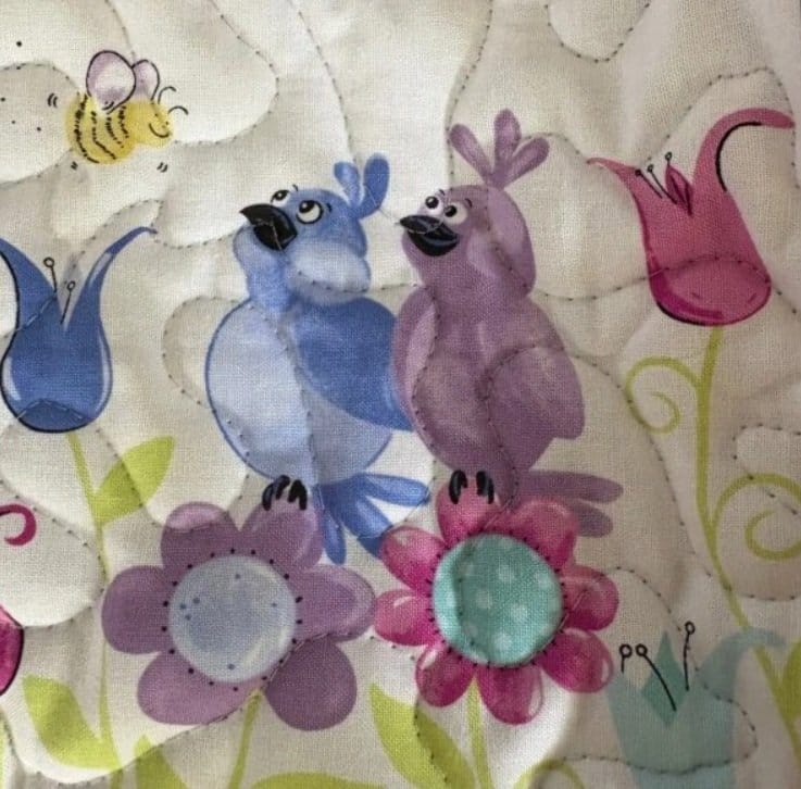 bird song in bloom baby quilt small bird detail