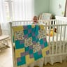 Animal ABC Baby Quilt in nursery with baby